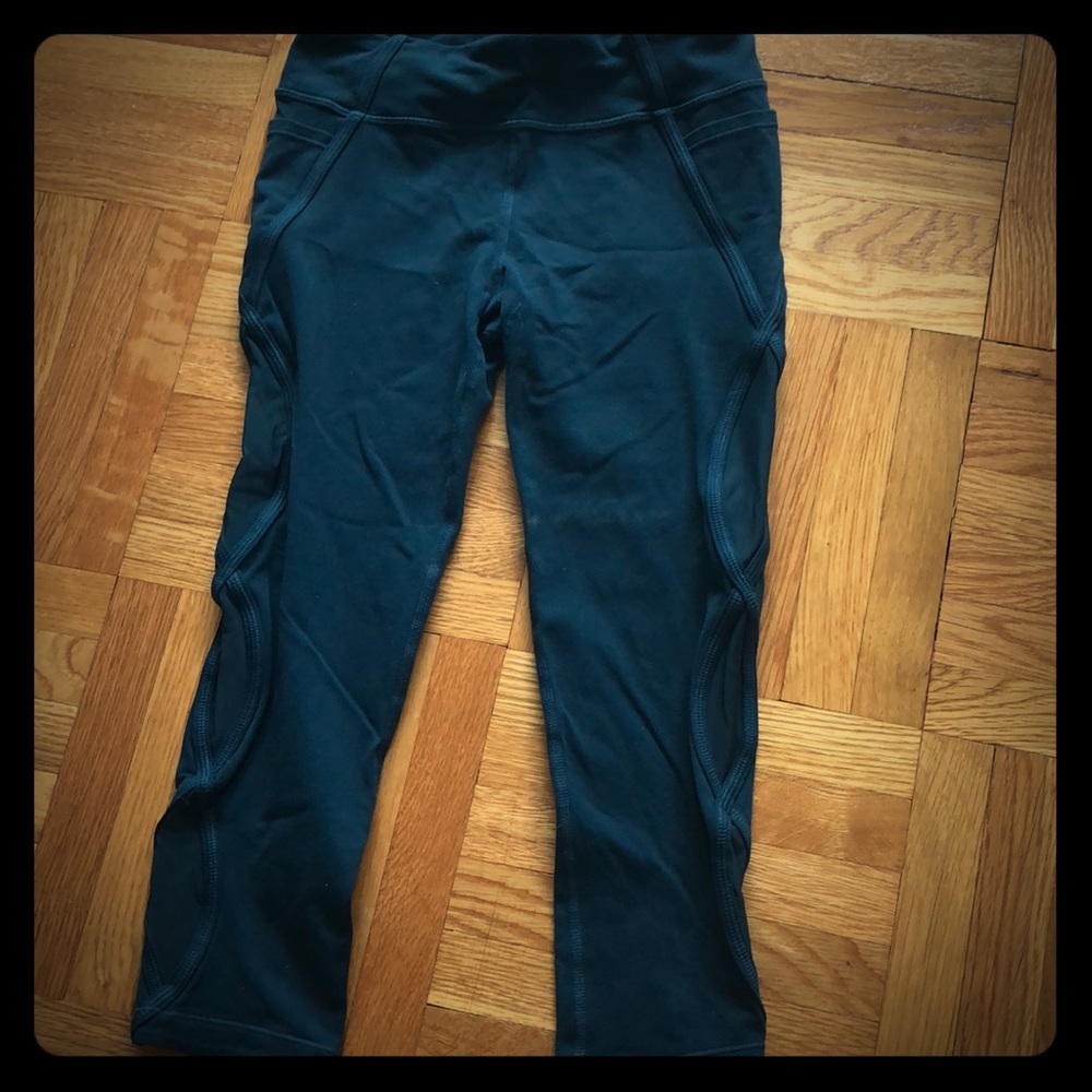 Athleta Girl Capris with Mesh Cutouts and Pockets